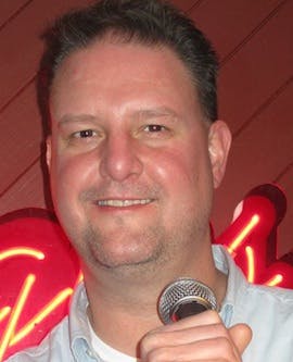 John Sharp smiling for the camera