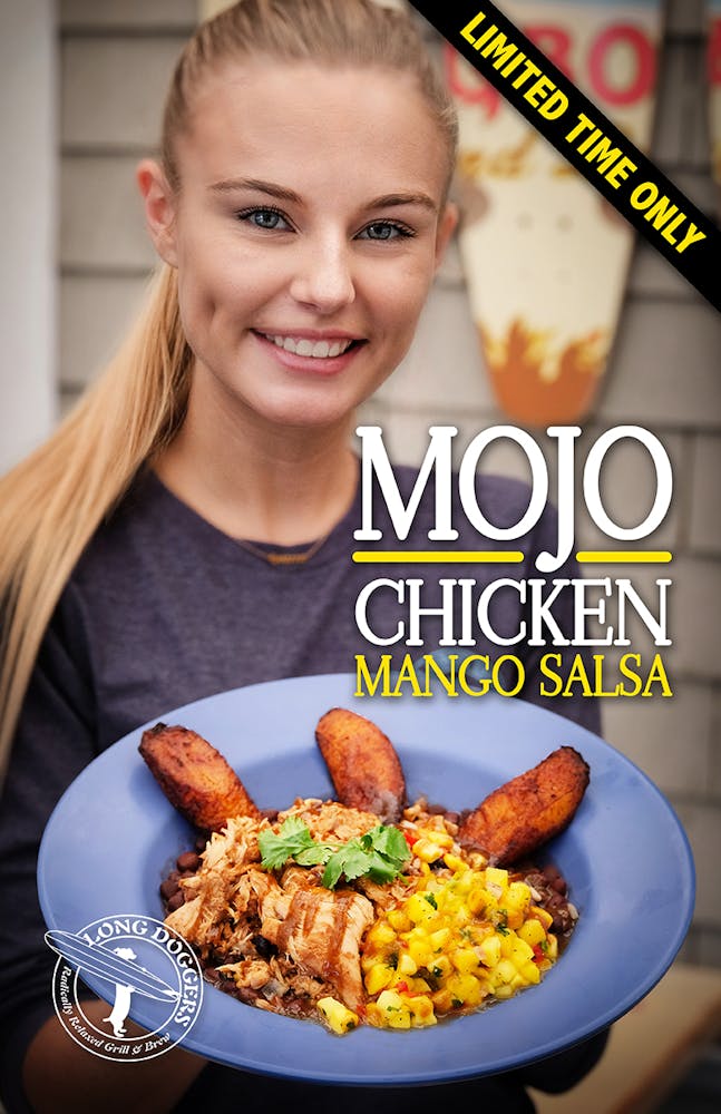 a woman holding a plate of food