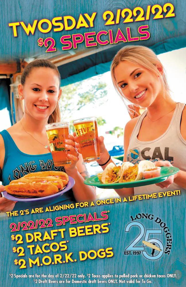 a woman holding a birthday cake