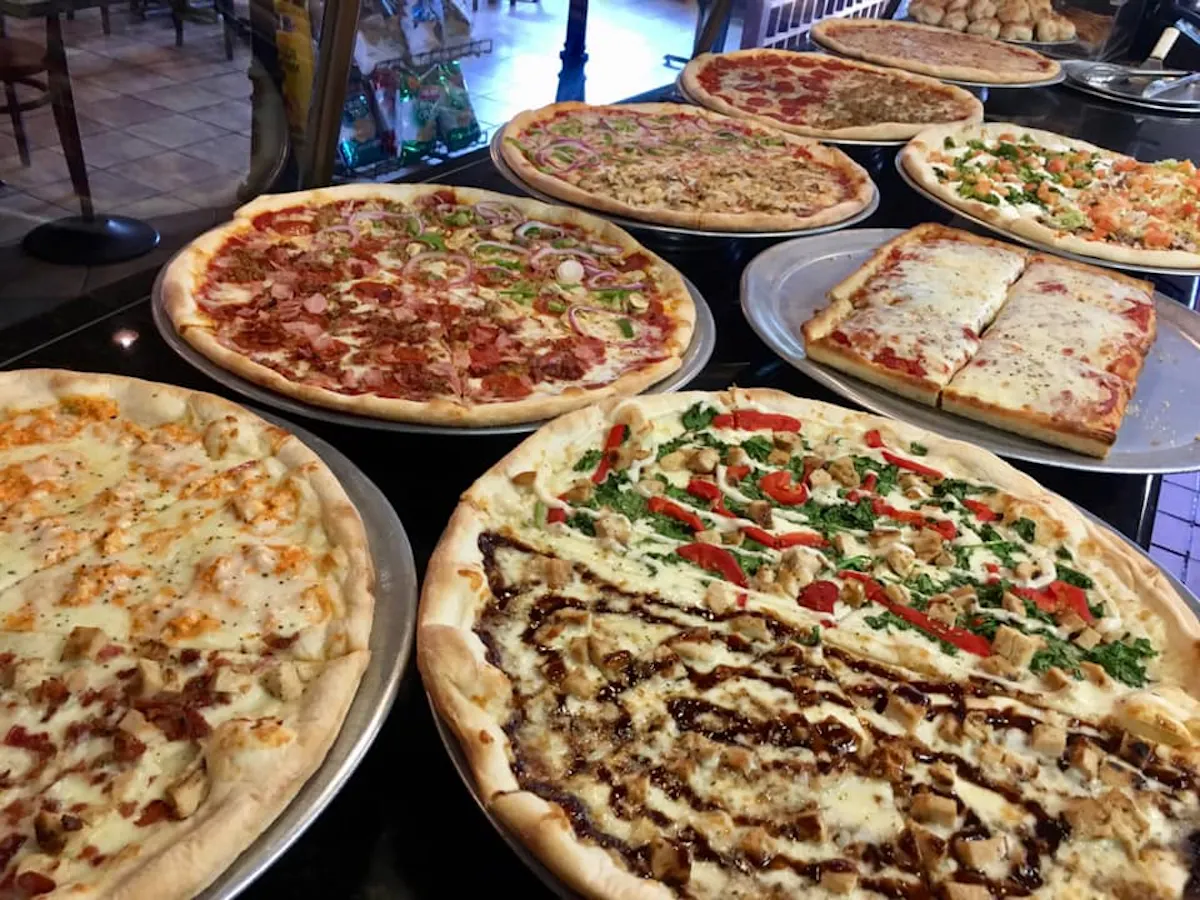 a pizza sitting on top of a table