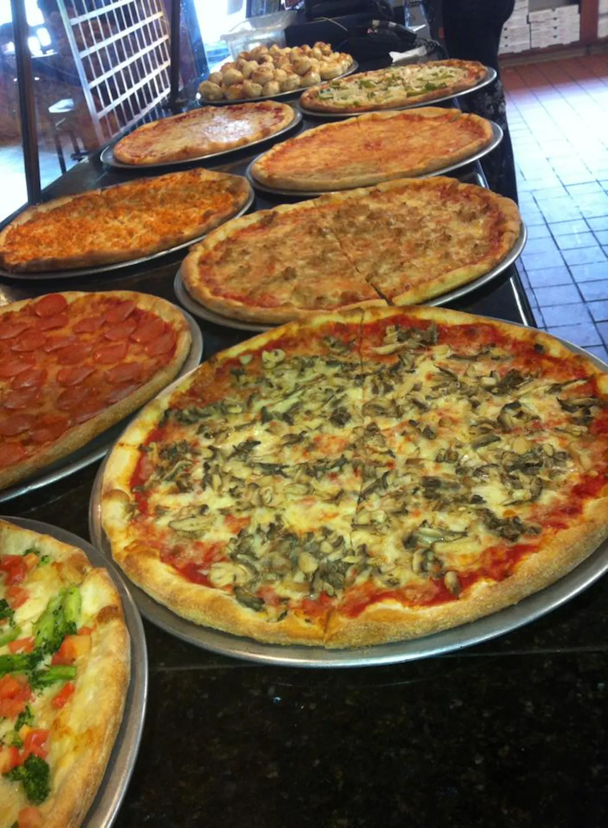 a pizza sitting on top of a table