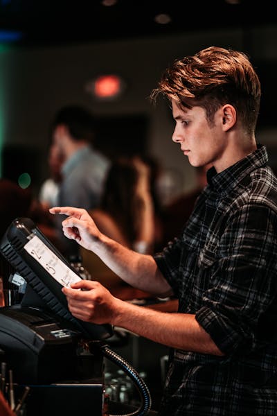 a man holding a remote control