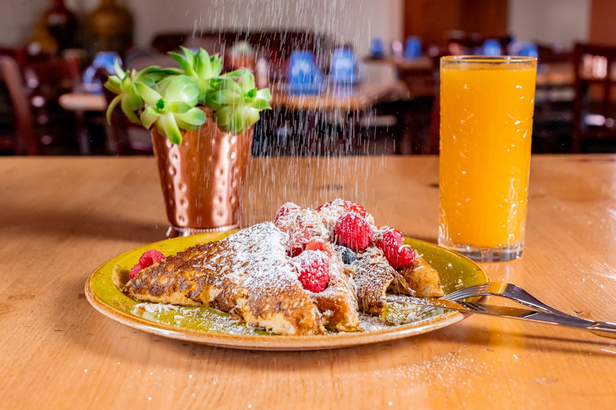 a piece of cake sitting on top of a wooden table