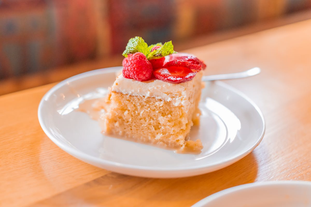 a close up of a piece of cake on a plate