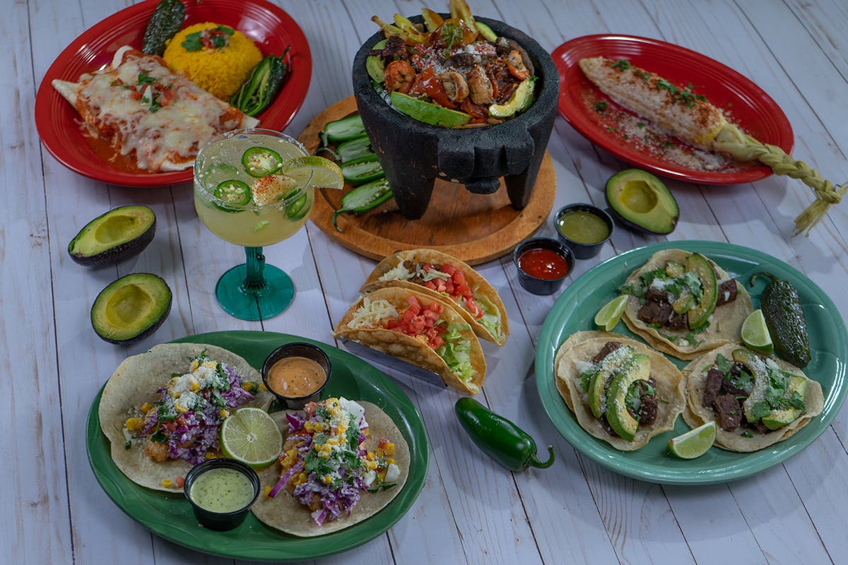 a table topped with plates of food on a plate