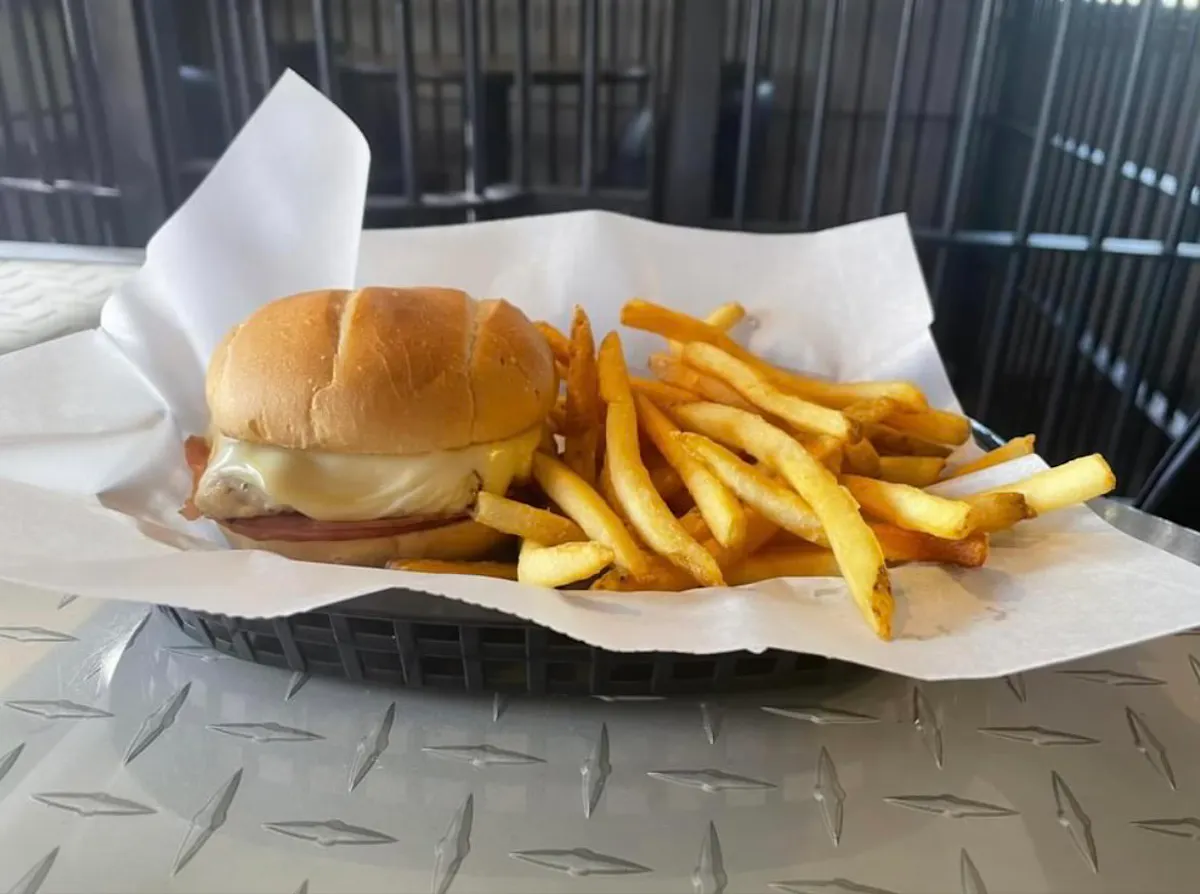 a hot dog and fries on a table