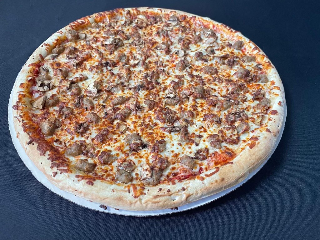 a pizza sitting on top of a table