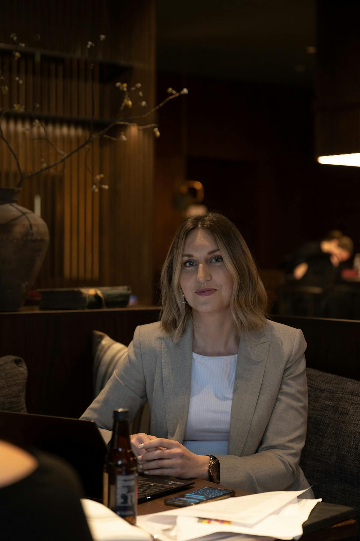 a woman sitting at a table