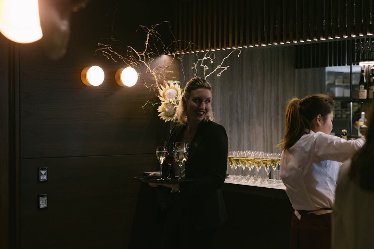 a man and a woman standing in front of a microphone