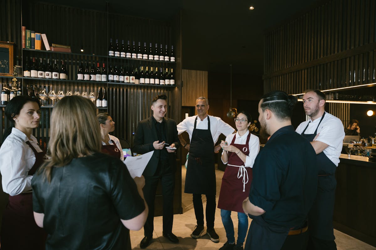 a group of people standing in front of a crowd