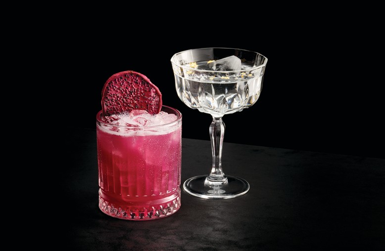a glass of liquid next to a glass of liquid