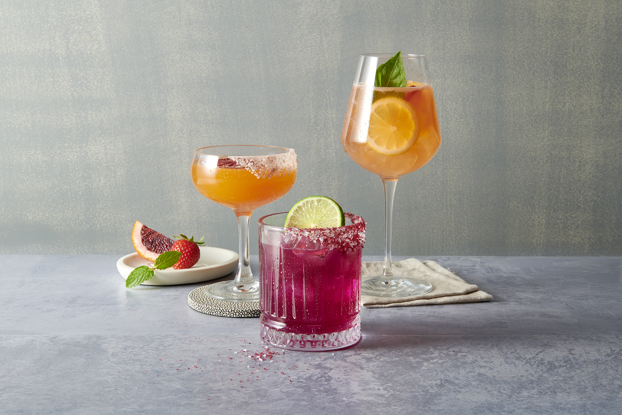 cocktail glasses on top of table