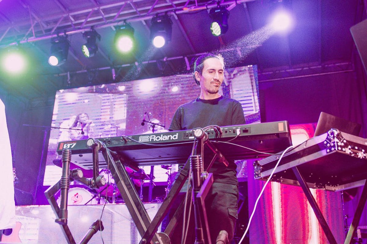 a person sitting on a stage