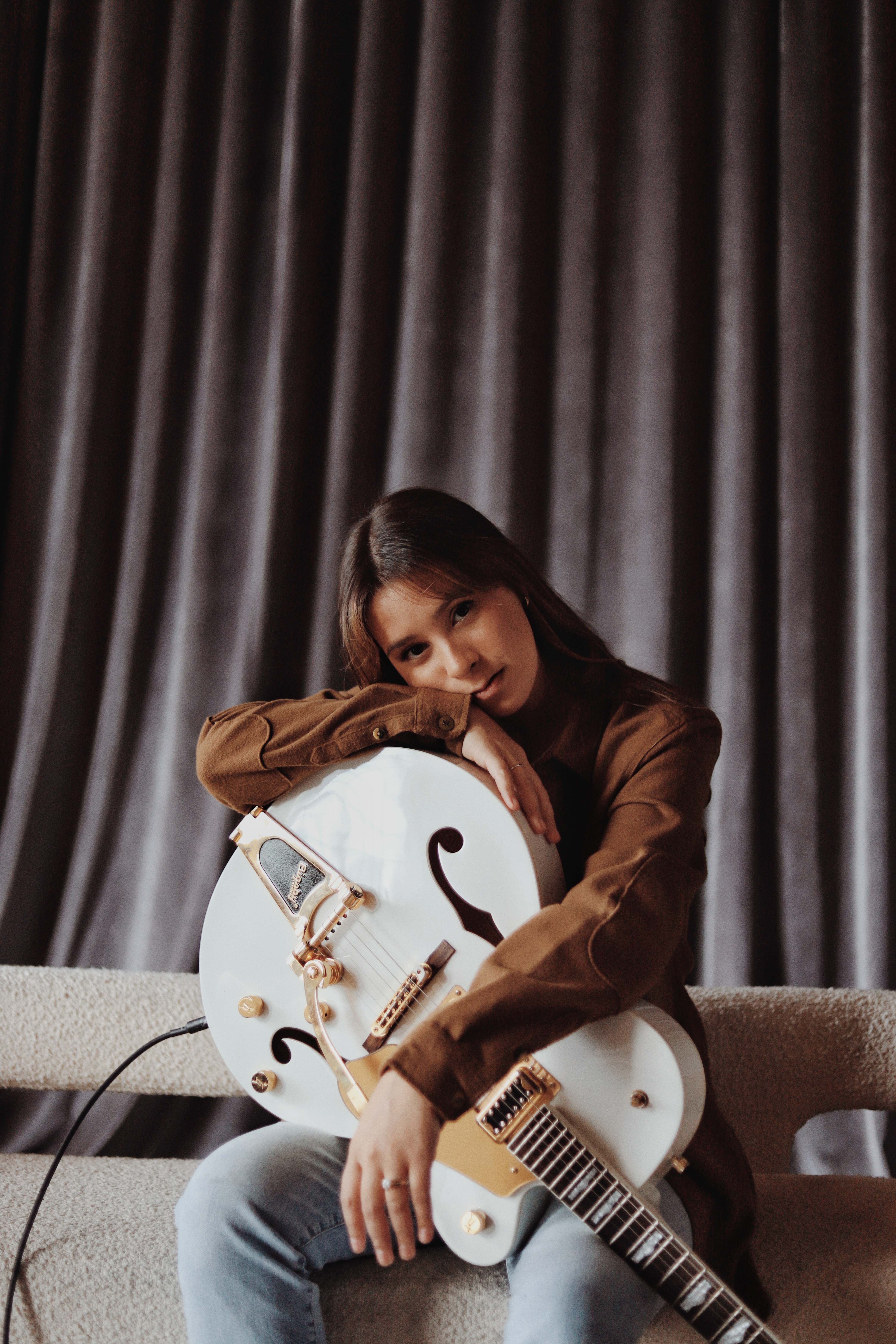 a person holding a guitar