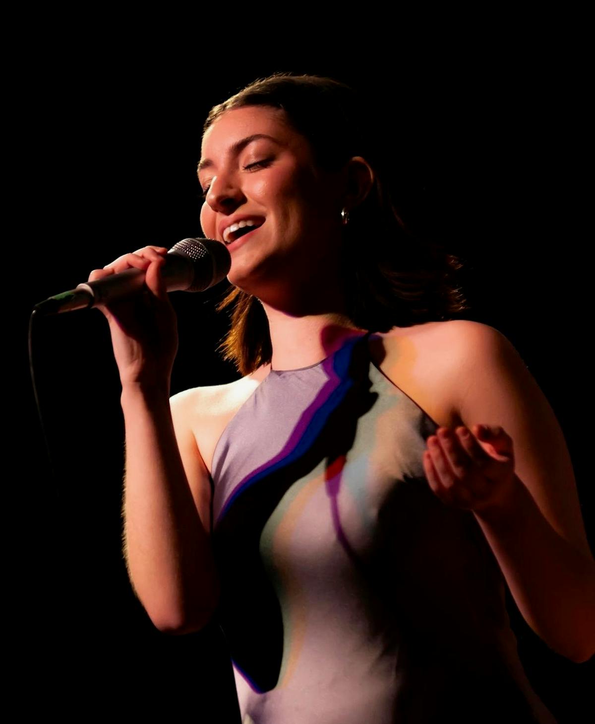 a woman wearing a microphone