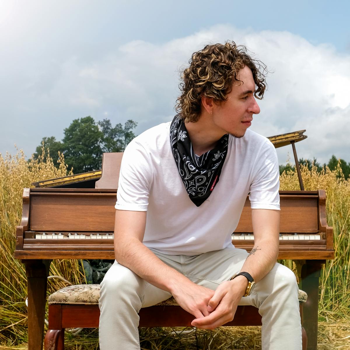 a man sitting on a bench