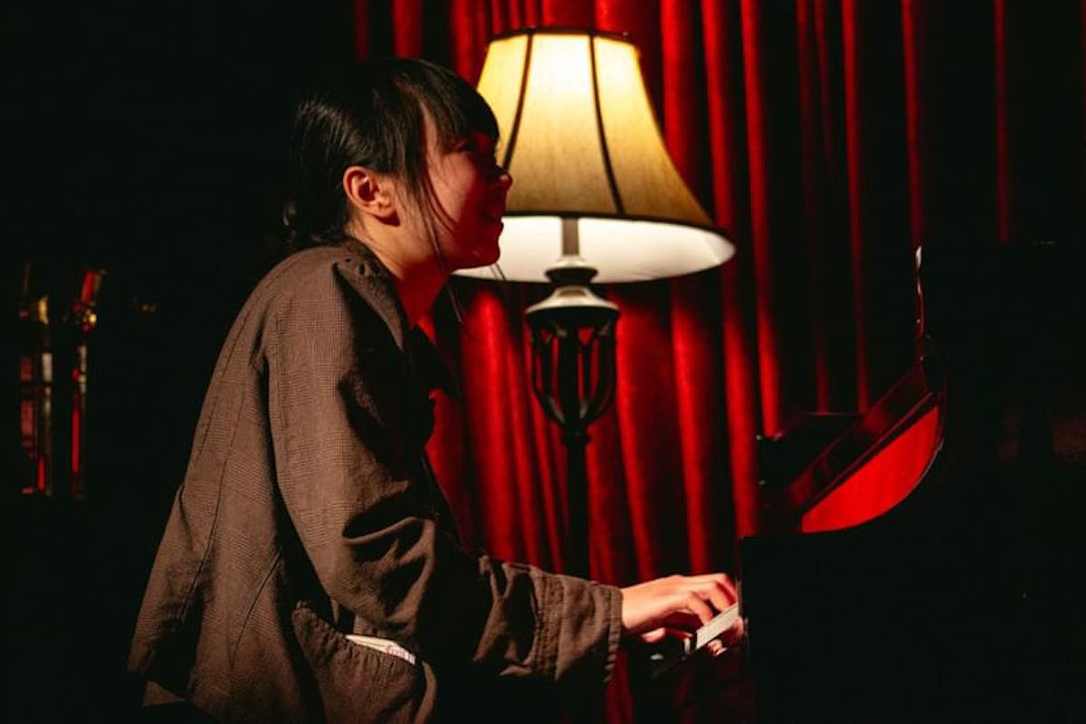a man standing in a dark room