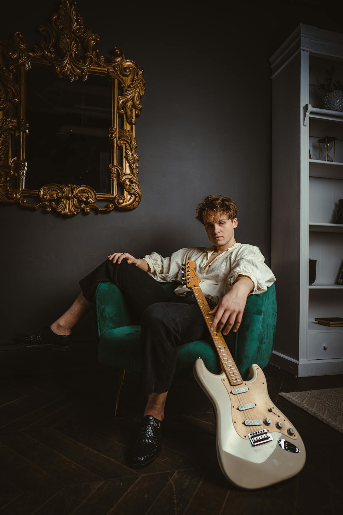 a person holding a guitar