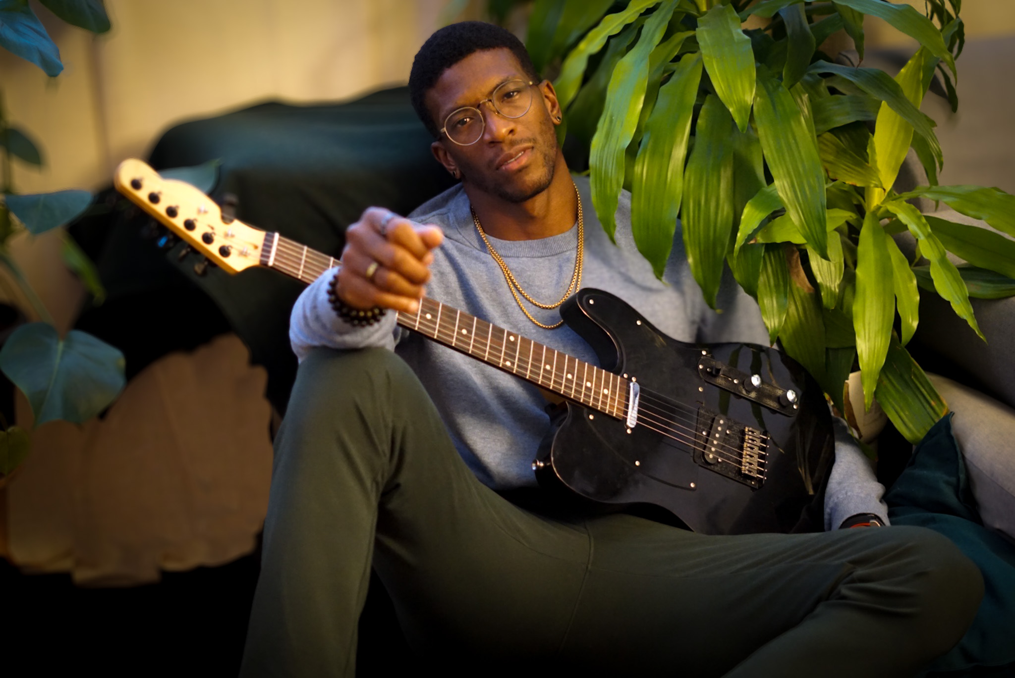 a man holding a guitar