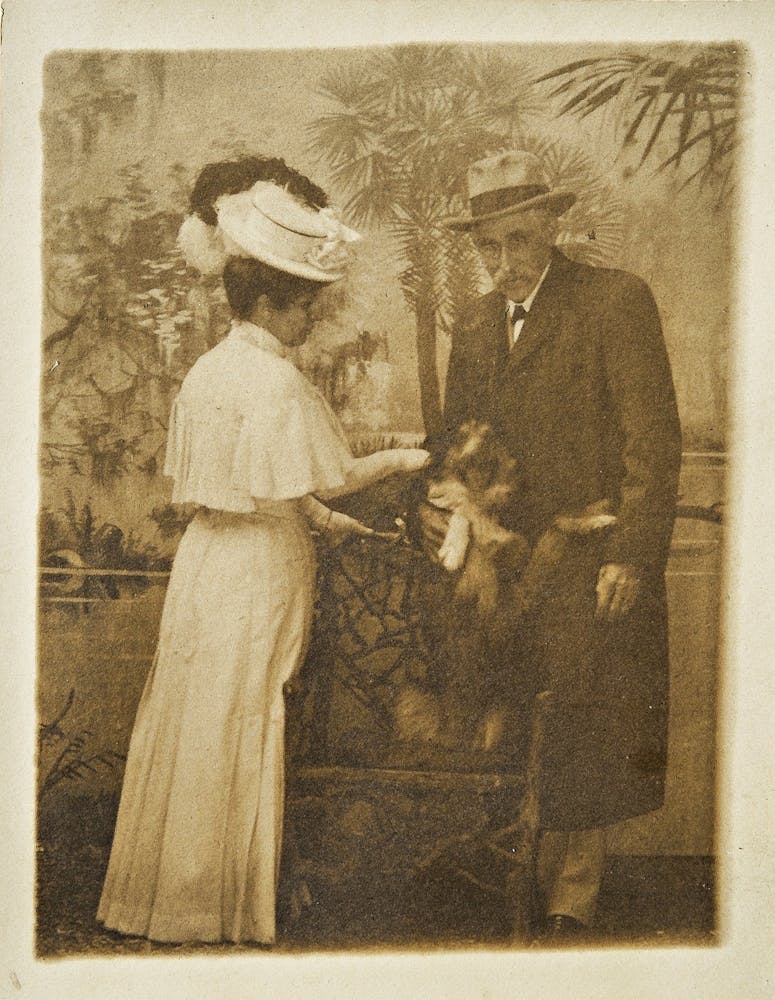 a vintage photo of a man and woman posing for a picture