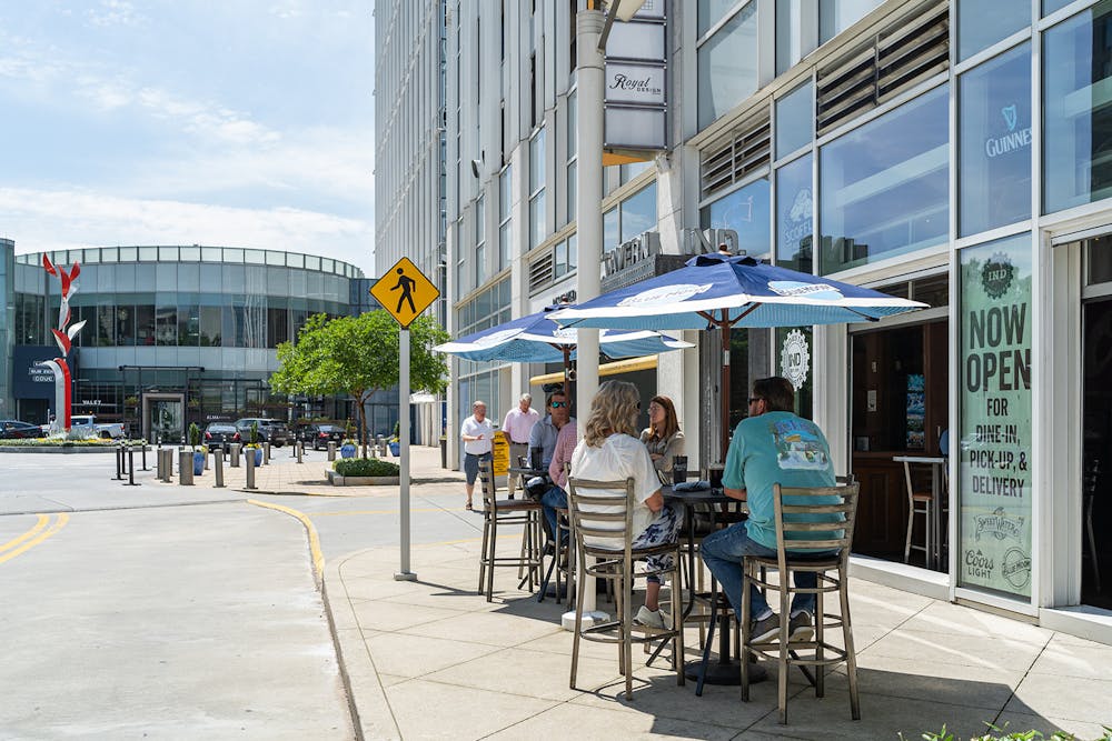 a group of people on a city street