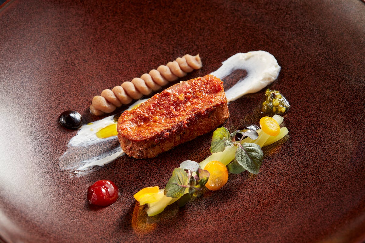 a piece of chocolate cake on a plate