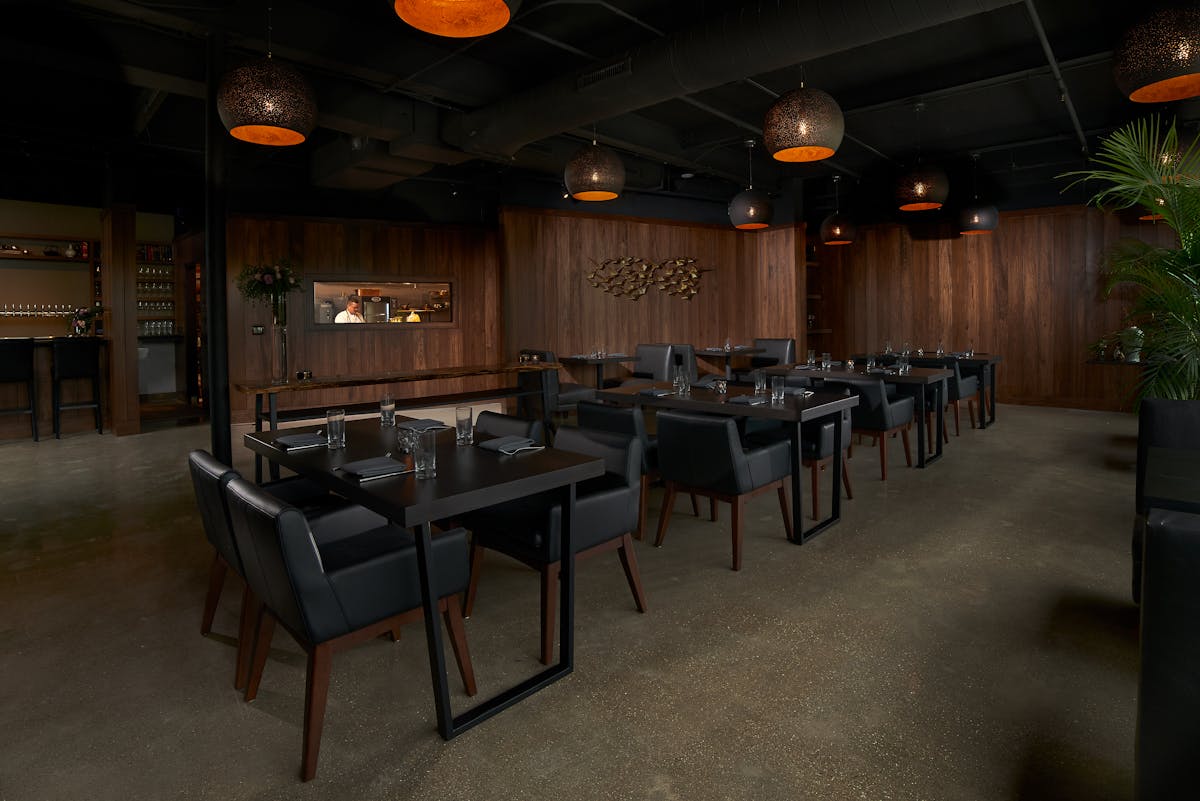 a room filled with furniture and a table