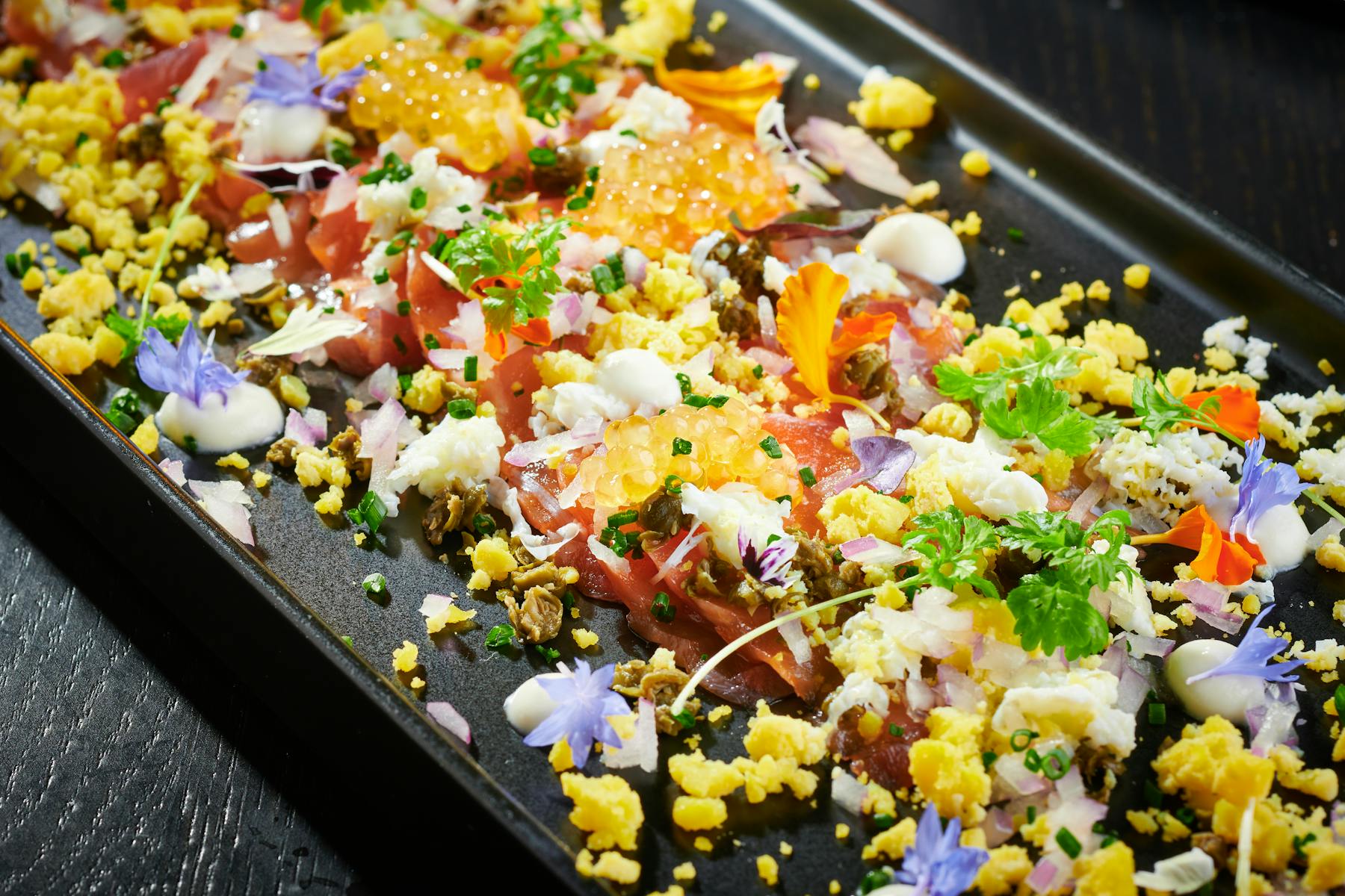 a tray of food with rice and vegetables