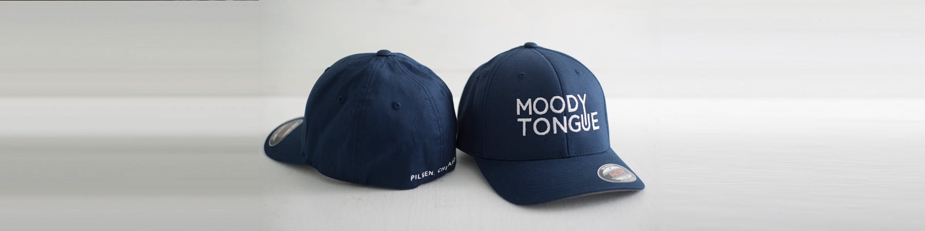 a close up of two hats