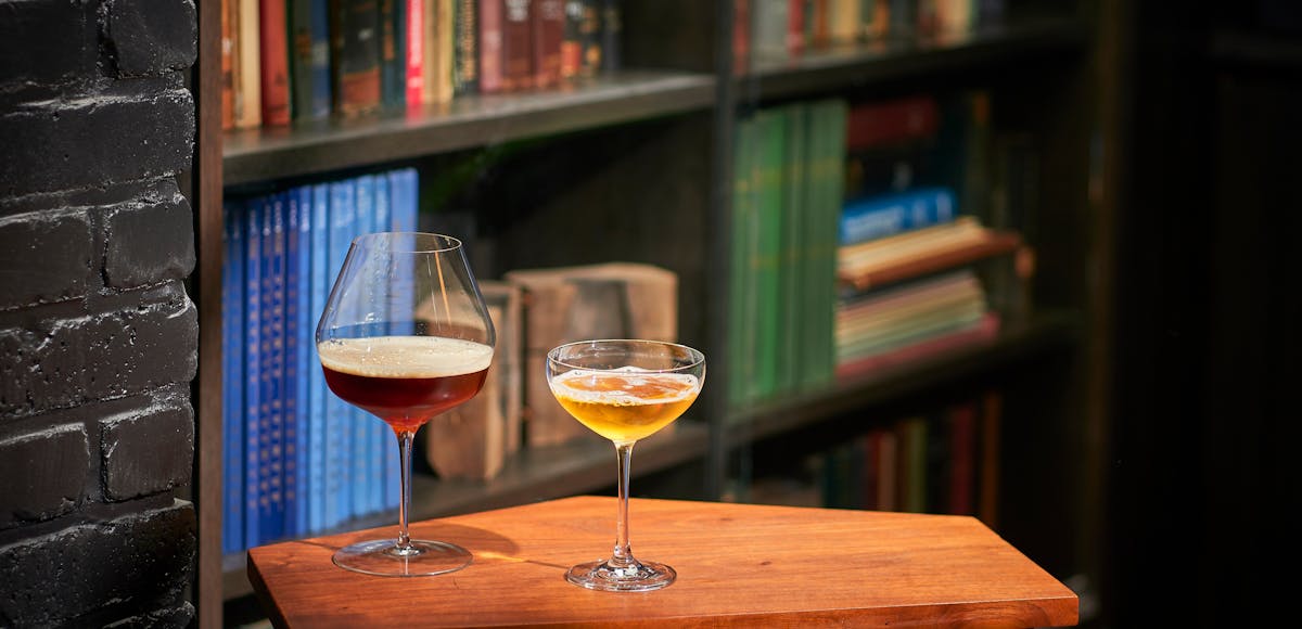 glasses of beer on a wooden table