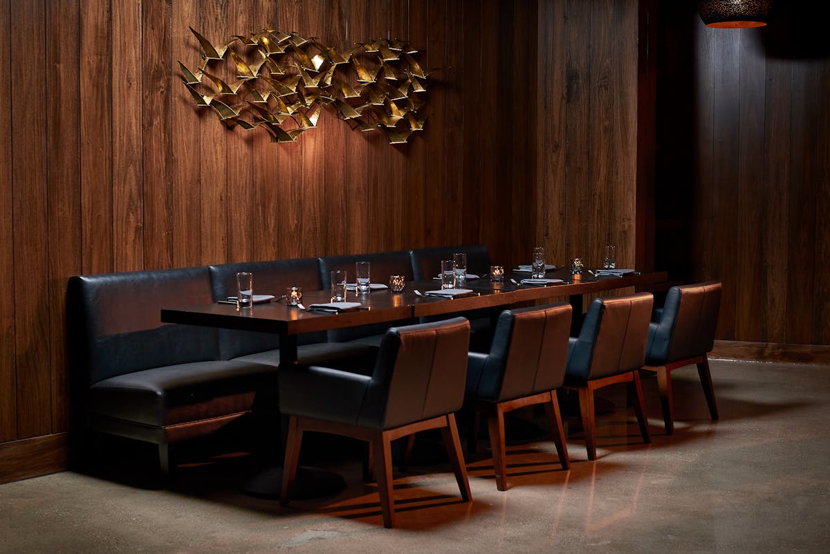 a wooden chair in a room