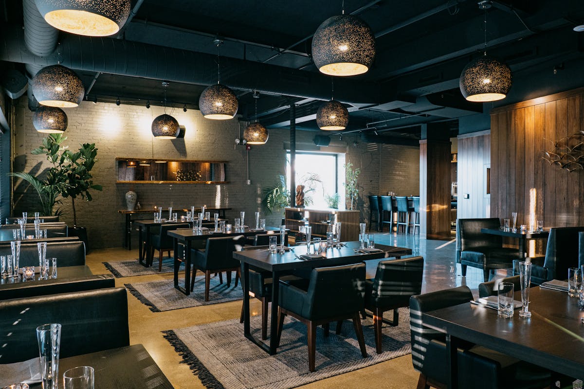 a kitchen with a dining room table