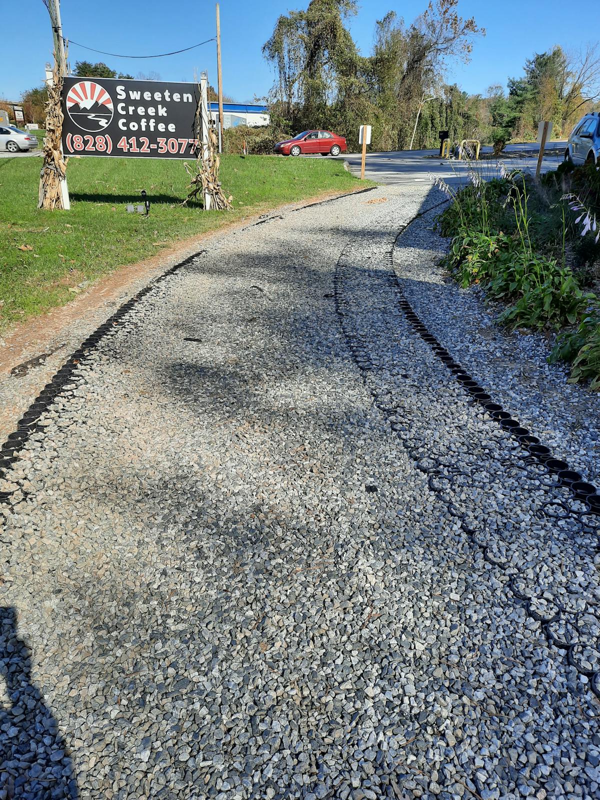 a train traveling down a dirt road
