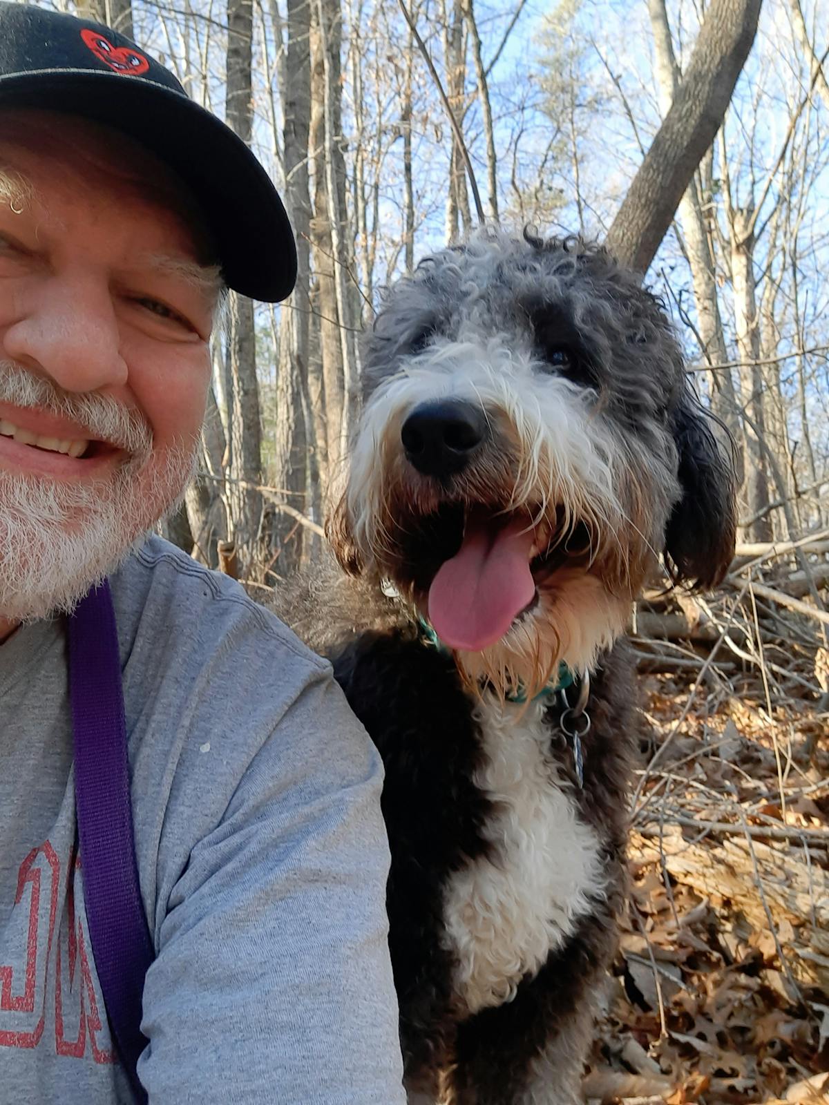 a close up of a person with a dog