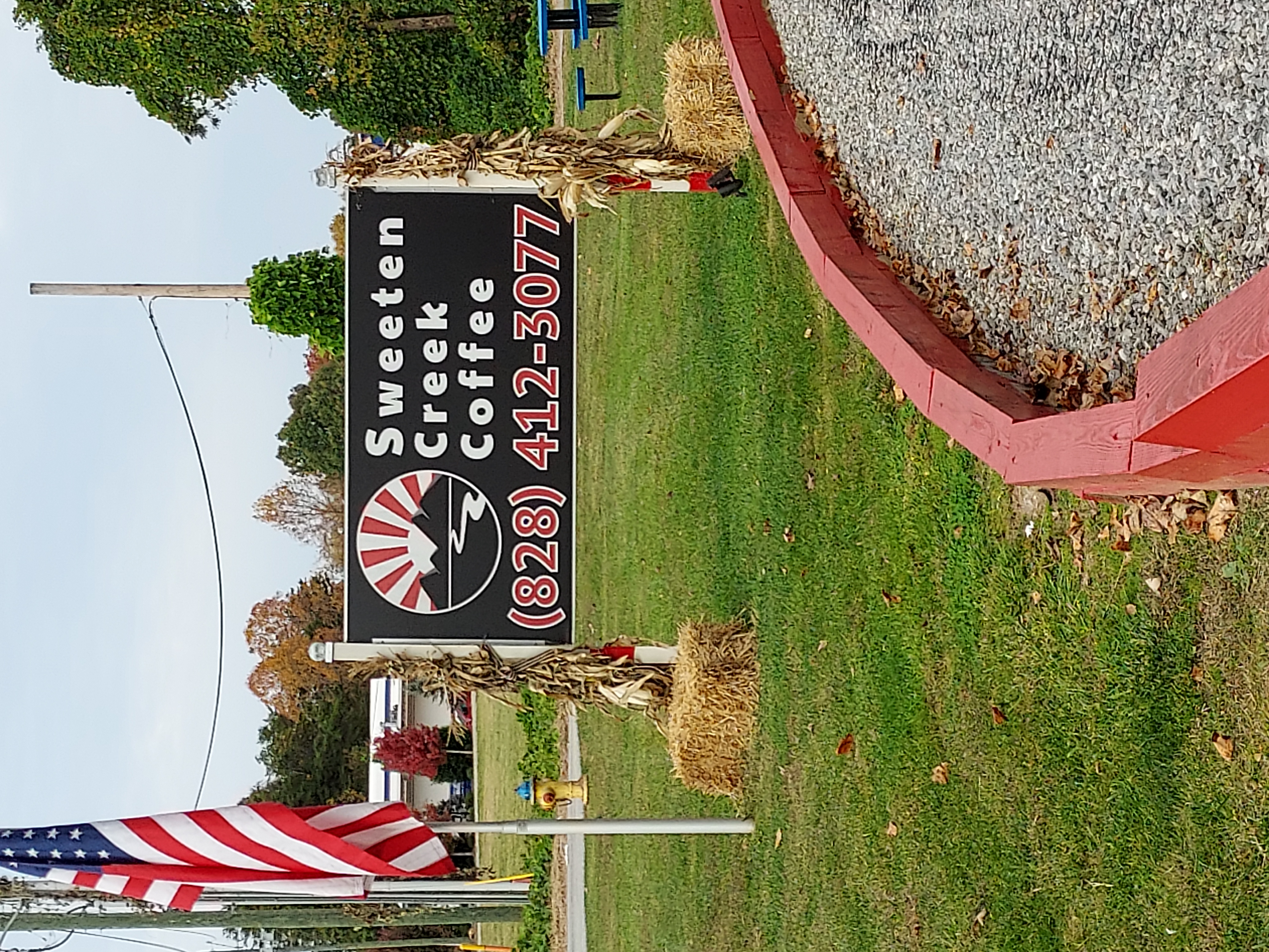 a sign in the middle of a field