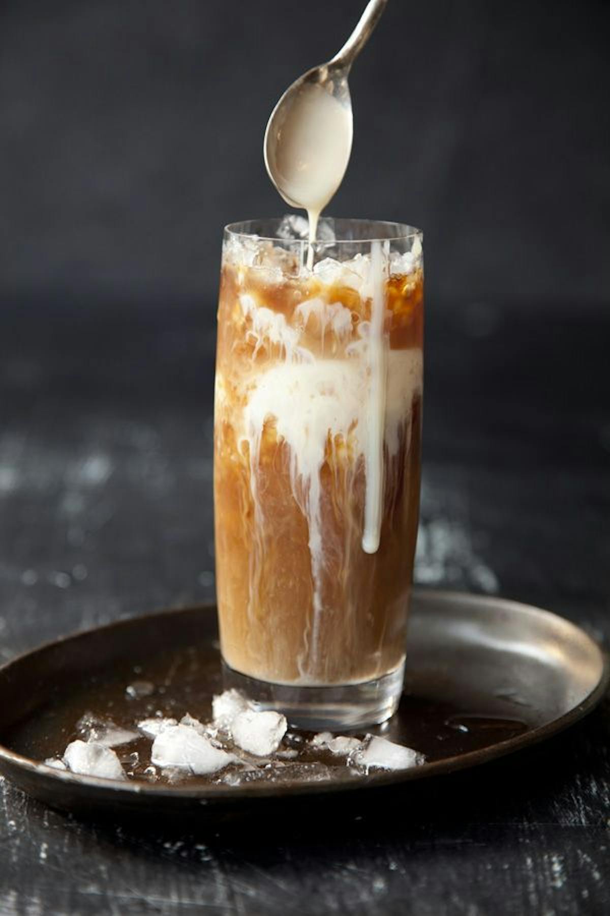 a cup of coffee and a glass of orange juice
