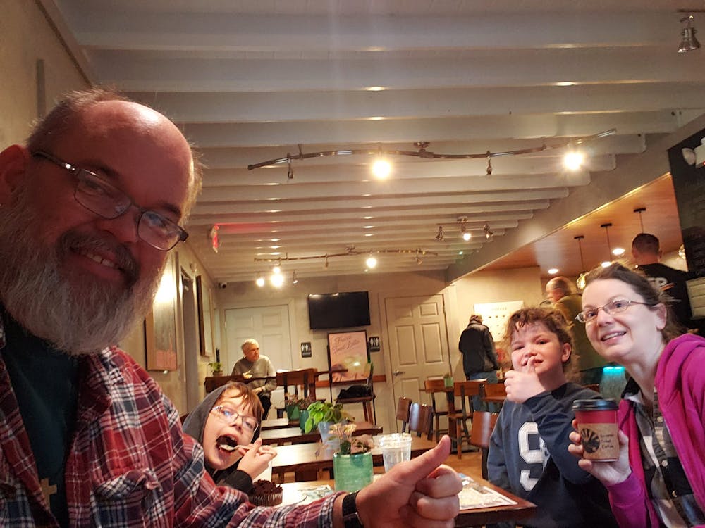 a group of people holding wine glasses