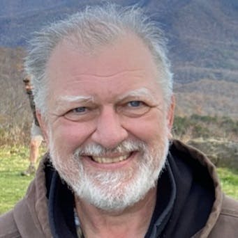 a man smiling for the camera