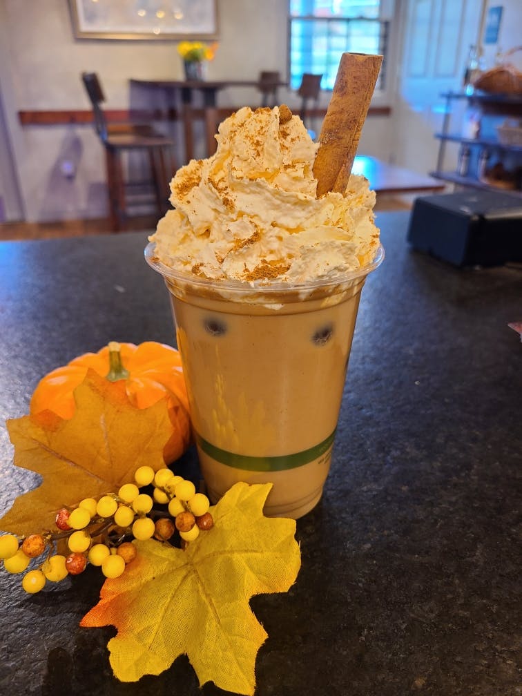 a cup of coffee on a table