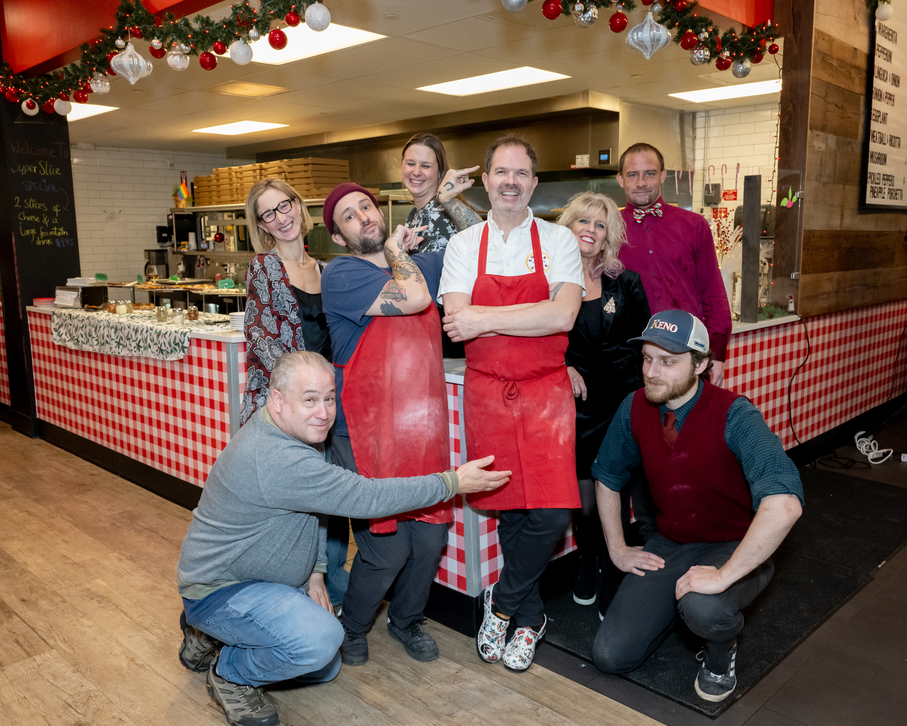 a group of people posing for the camera