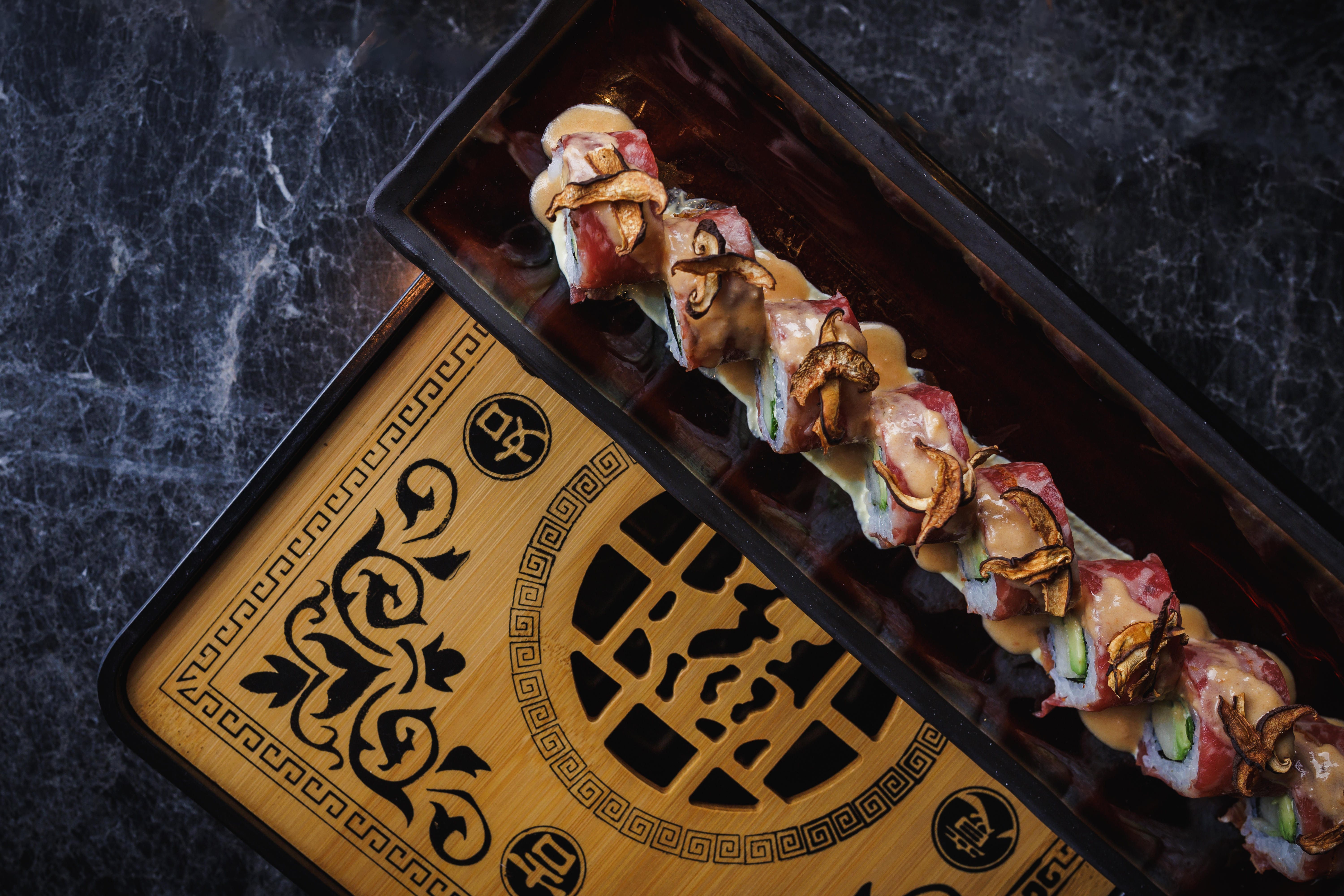 Wagyu Mofu*  torched a5 wagyu, cucumber, avocado, asian pear, huancaina, rocoto chili butter, shiitake bacon