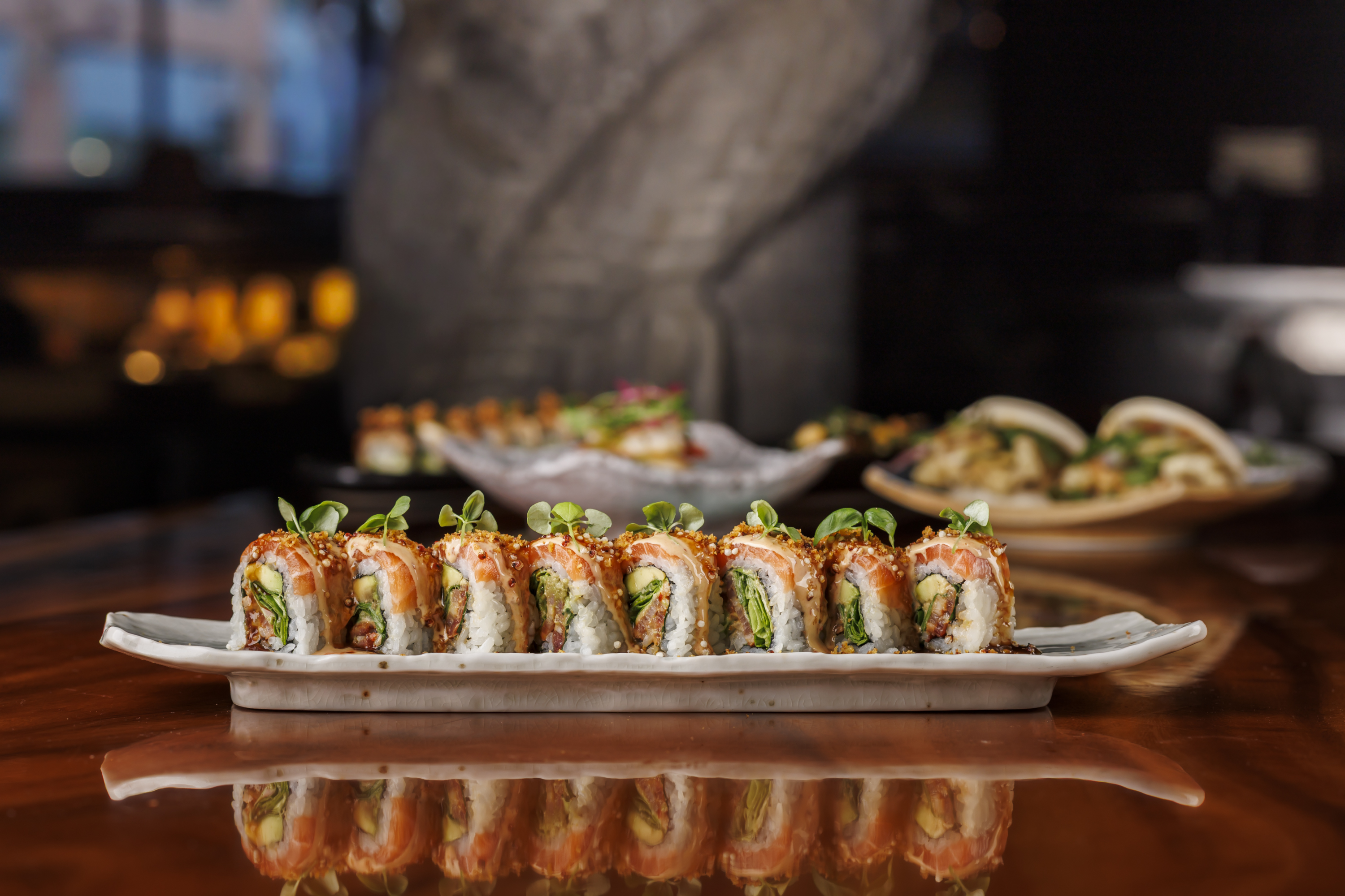 a plate of sushi on a table