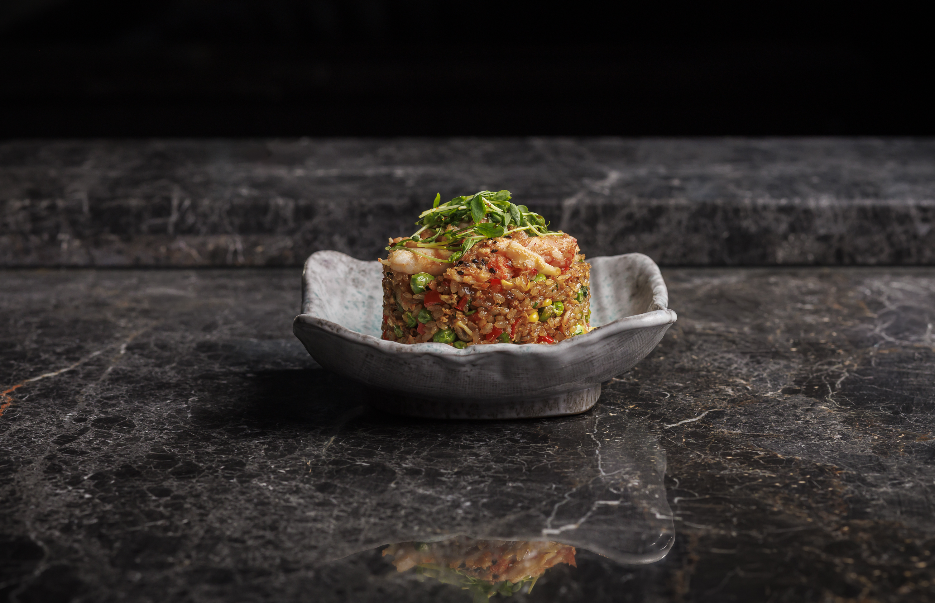 Crab Yakimeshi: jumbo lump atlantic crab, curry fried sushi rice, egg, kimchee butter, sweet peas & corn