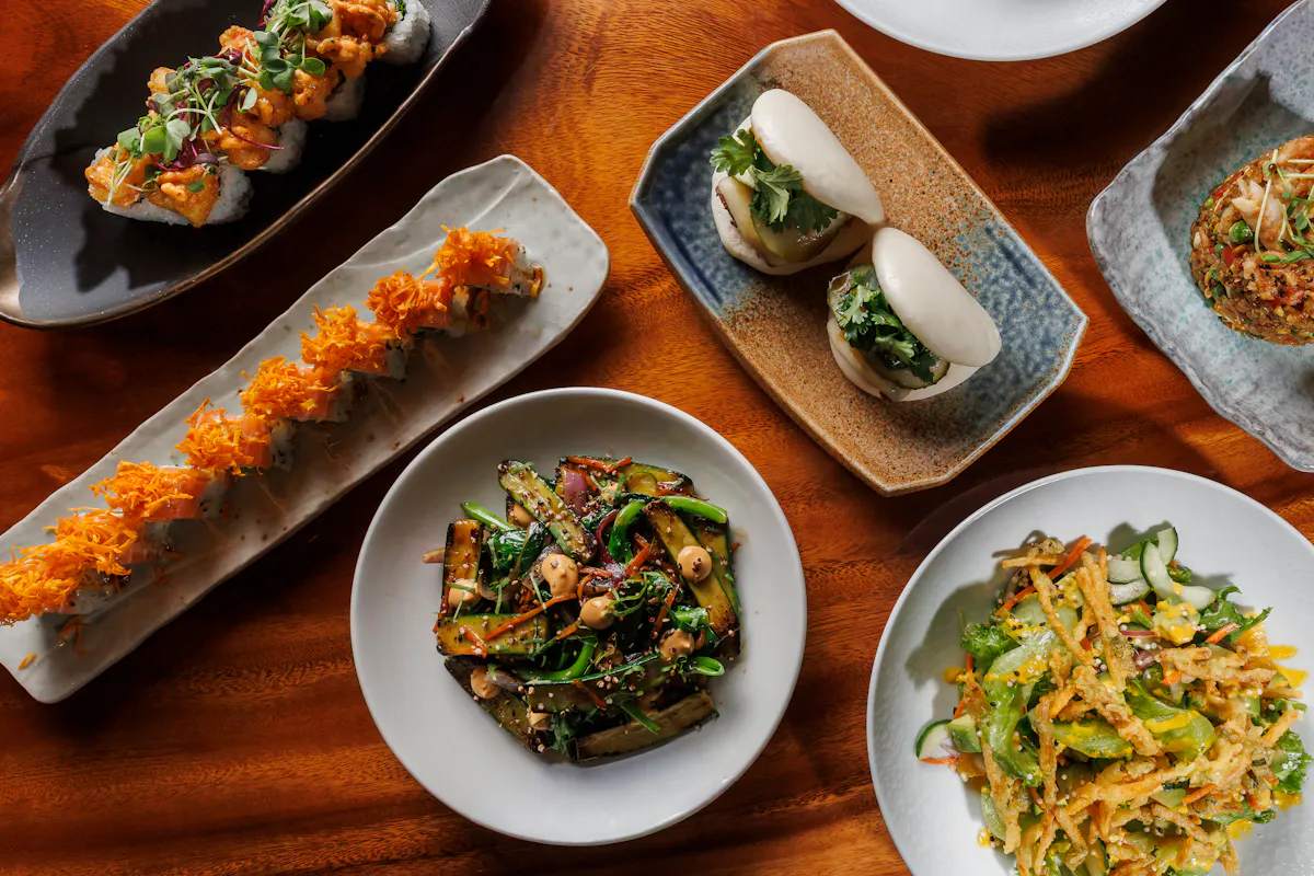 Lobster Norteña, Salmon Acevichado, Zucchini Itame, Sweet Potato Buns, Kakiage Salad & Crab Yakimeshi  