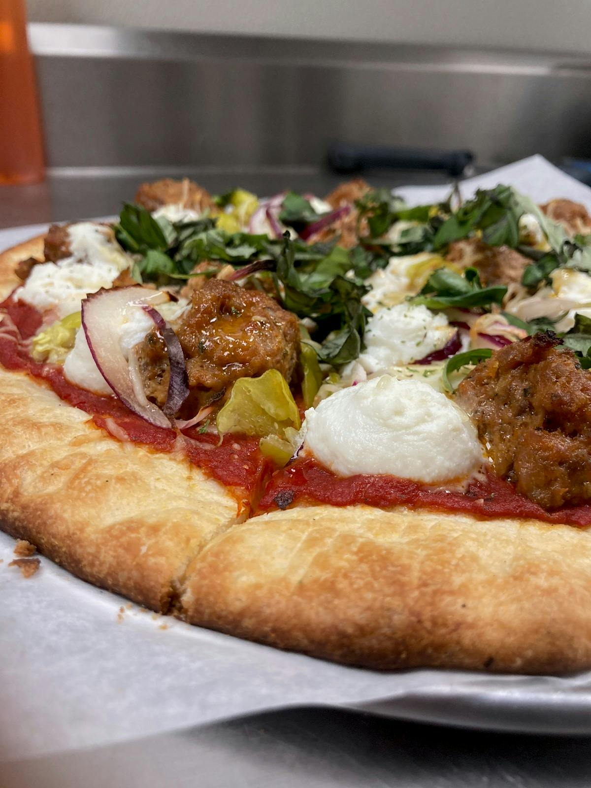 a pizza sitting on top of a table
