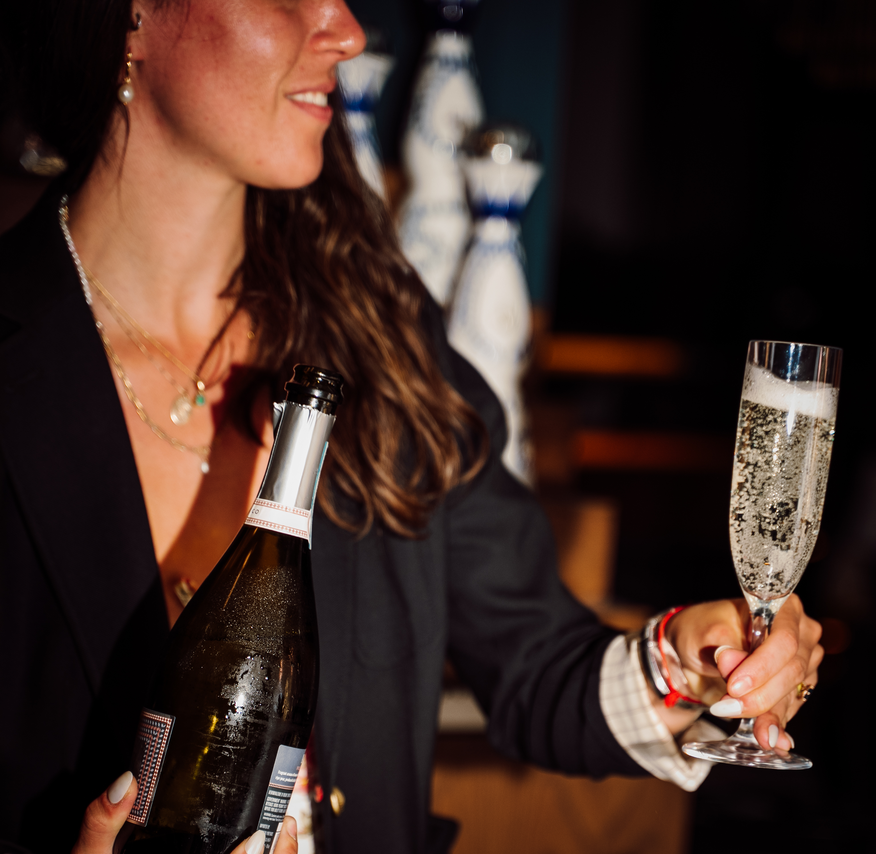 a person holding a wine glass