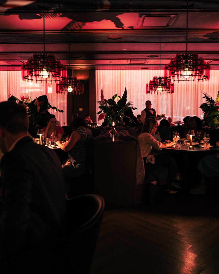 a group of people in a dark room