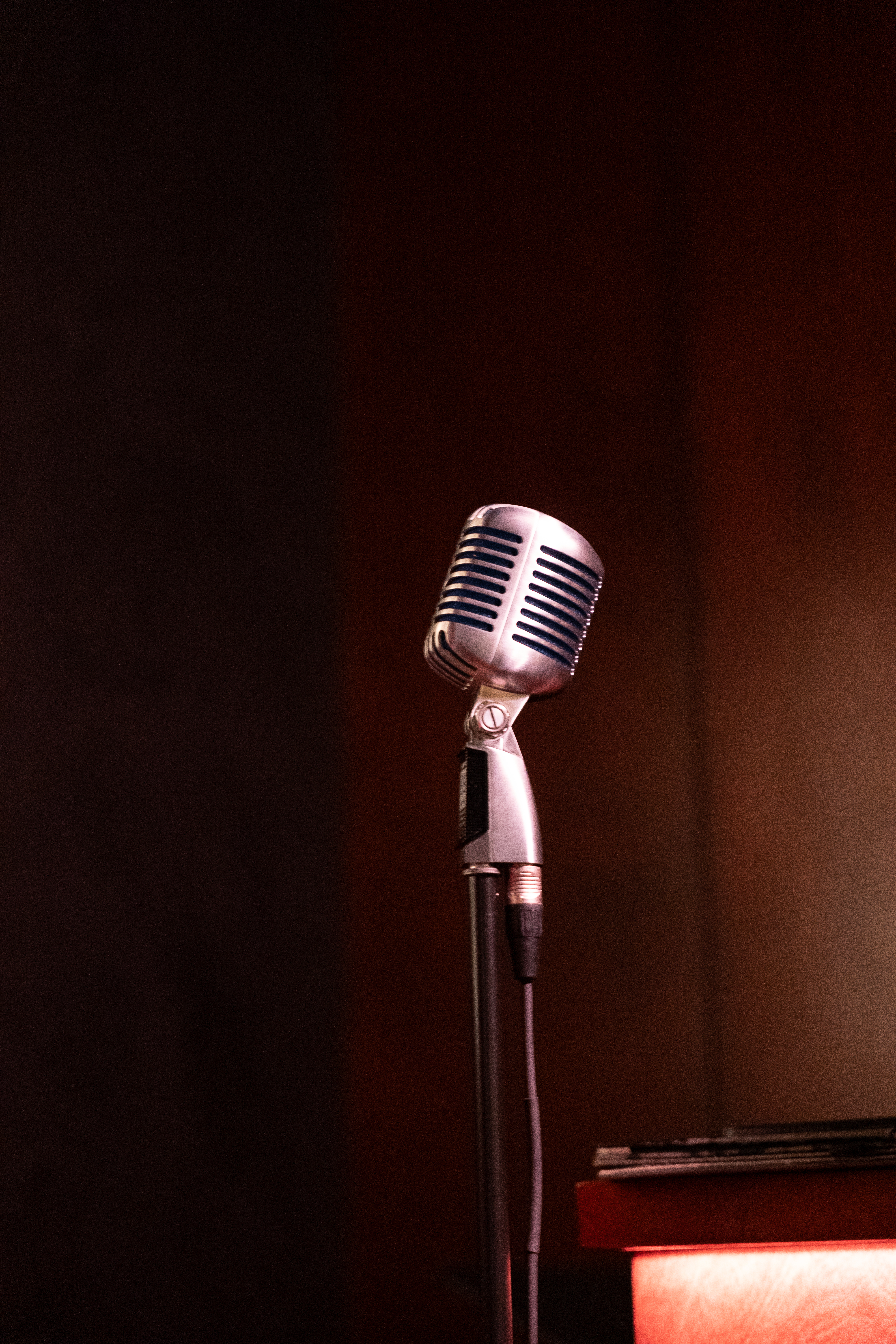 a microphone next to a lamp