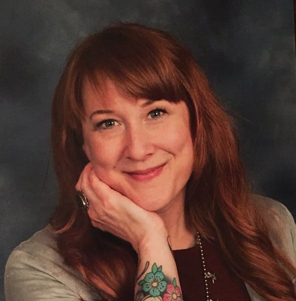 a woman smiling for the camera