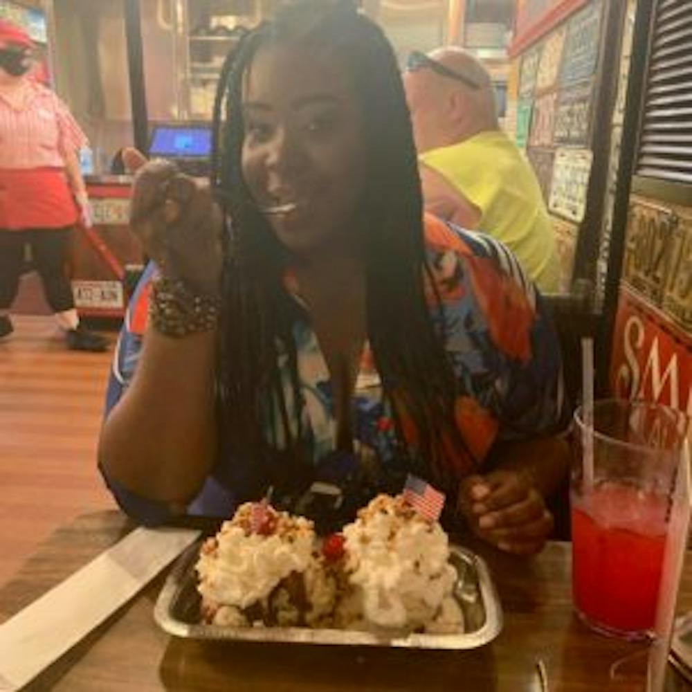 a woman eating ice cream